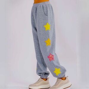 WOMEN'S ELASTIC WAIST FRONT POCKET SEQUINS STARS DETAILED SWEATPANTS Large
